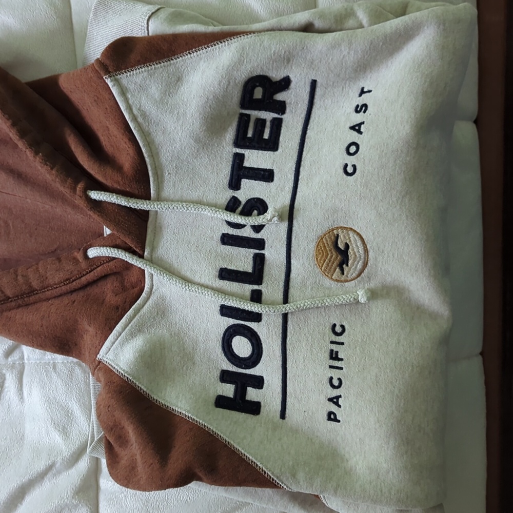 white and brown Hollister hoodie in medium